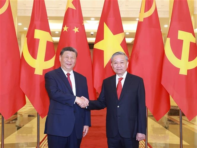 លោក ស៊ី ជីនពីង(ឆ្វេង) និងលោក តូ ឡឹម